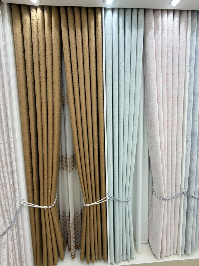 Gold and aqua curtain fabrics